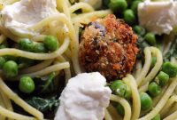 Spaghetti with Eggplant Meatballs, Pesto, Peas & Greens