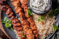 Citrus Achiote Chicken Skewers with Spiced Pepper Rice