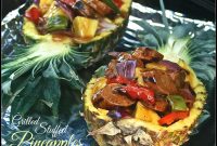 Grilled Stuffed Pineapple with Sausage, Peppers, Poppy Seed Sauce