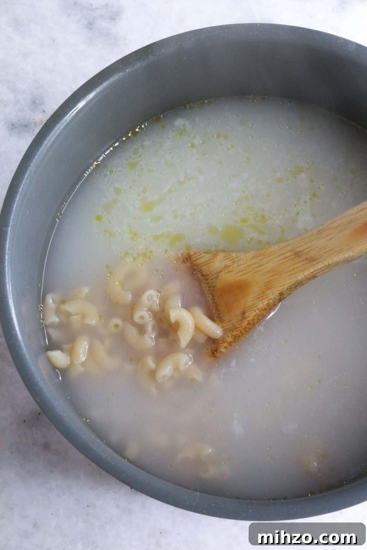 Mexican Macaroni Pasta Salad with Creamy Dressing 4 Boiling macaroni noodles