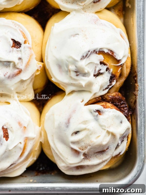 Single-Layer Funfetti Cake Recipe for Bright, Moist Celebration Cakes 15 Frosted small batch cinnamon rolls on baking sheet.