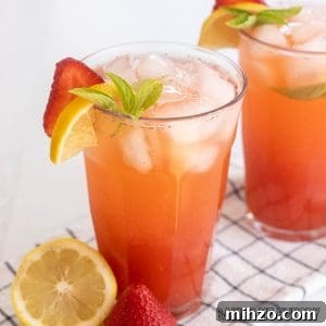 Strawberry Basil Lemonade Recipe: Refreshing Summer Drink 15 strawberry basil lemonade recipe close up in two glasses with garnish