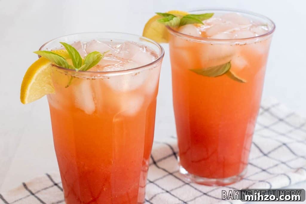 Strawberry Basil Lemonade Recipe: Refreshing Summer Drink 9 strawberry basil lemonade recipe in two glasses