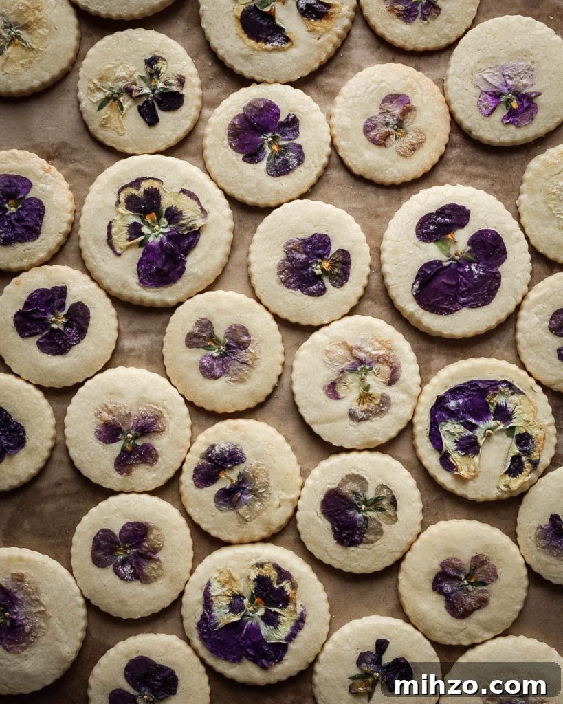 Orange Blossom Shortbread Cookies with Edible Flower Garnish 2 orange blossom shortbread cookies with edible flowers