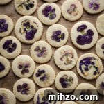 Orange Blossom Shortbread Cookies with Edible Flower Garnish 3 orange blossom shortbread cookies with edible flowers