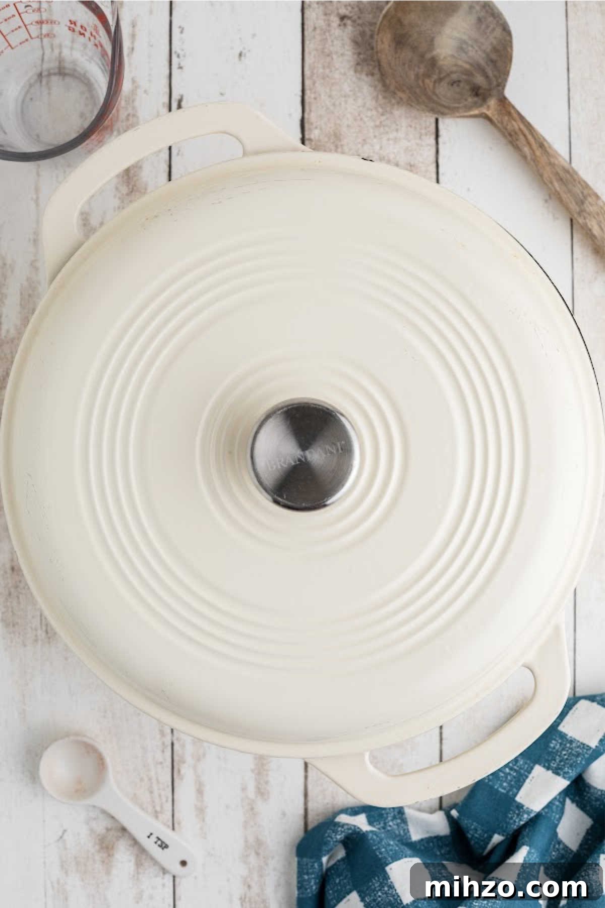 Southern-Style Great Northern Beans Recipe: Savory Slow-Cooker Method 6 A large Dutch oven with a lid covering it.