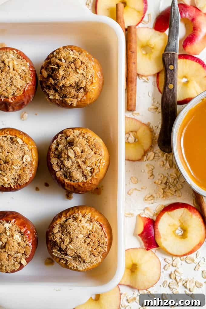 Warm Cinnamon Baked Apples Recipe for Fall Desserts 4 baked apples in a dish