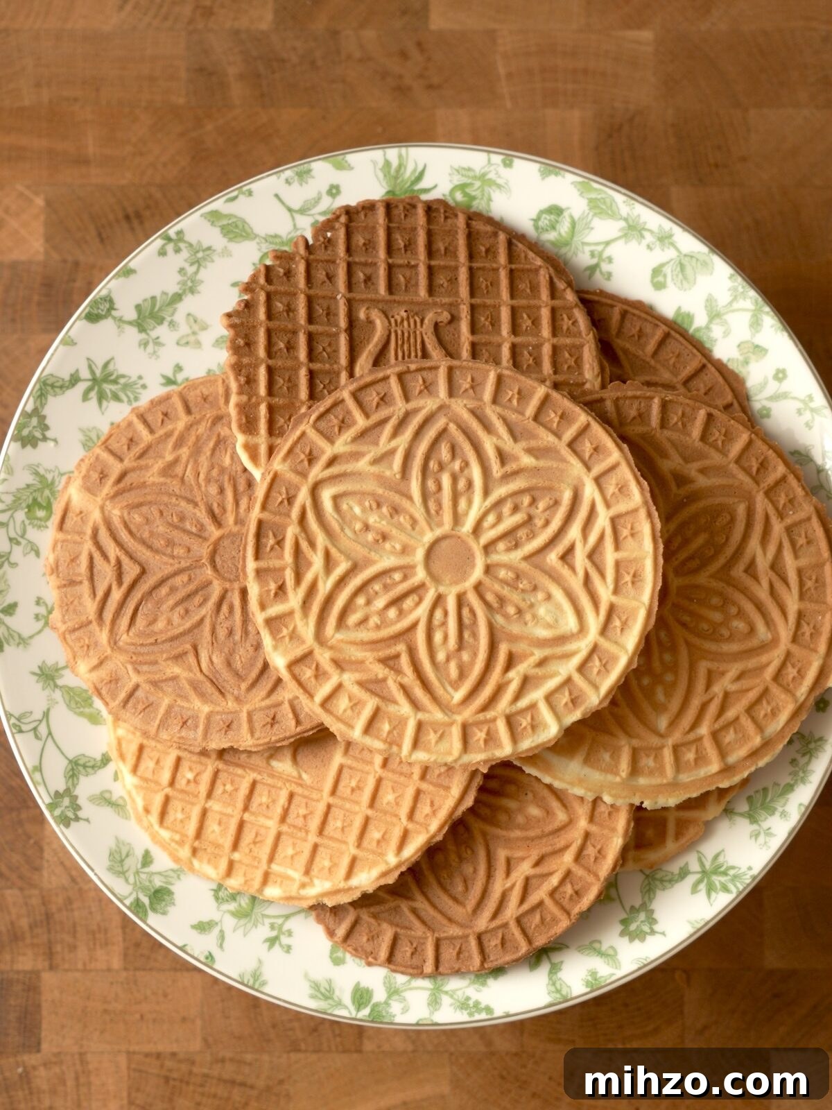 Pizzelle Recipe: Traditional Italian Waffle Cookies Guide 2 9 pizzelles on a plate