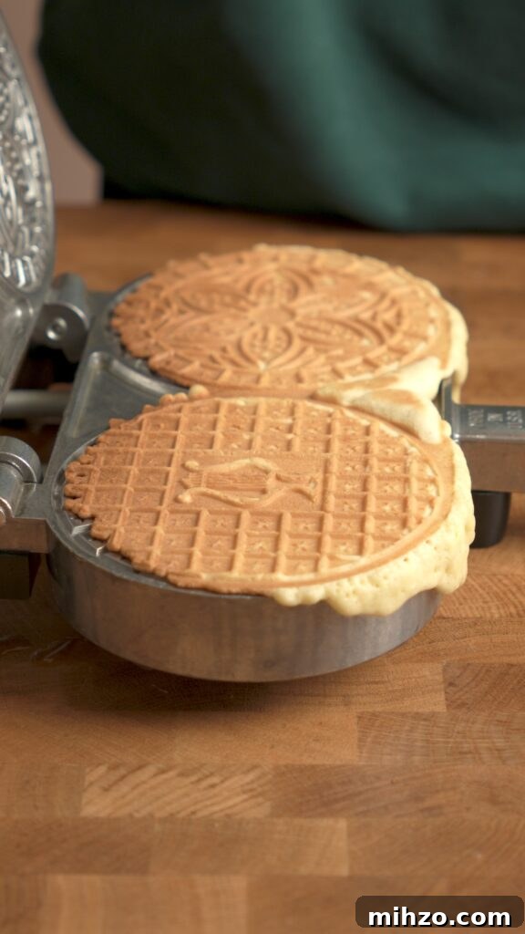 Pizzelle Recipe: Traditional Italian Waffle Cookies Guide 7 A pizzelle fully cooked