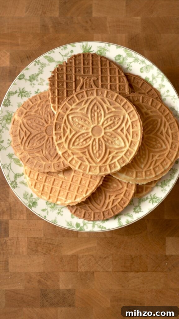Pizzelle Recipe: Traditional Italian Waffle Cookies Guide 9 9 pizzelles on a plate