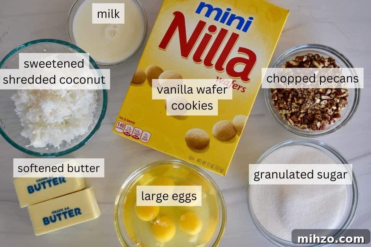 Classic Vanilla Wafer Cupcakes with Creamy Buttercream Frosting 4 overhead photo of ingredients including Nilla cookies, butter, eggs, pecans, coconut, and sugar.