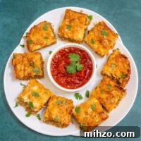 Spicy Chorizo Quiche Squares Recipe for Brunch or Parties 2 Platter of chorizo quiche squares.