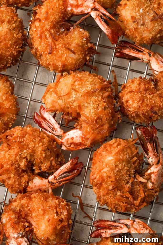 what goes with coconut shrimp five-spice coconut shrimp on a platter on a wire rack