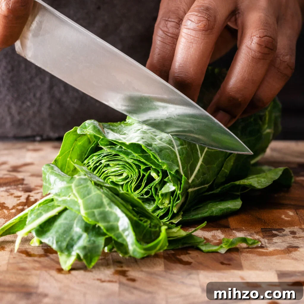 Savory Collard Greens with Smoked Ham Hocks Recipe 7 cutting rolled up collard greens
