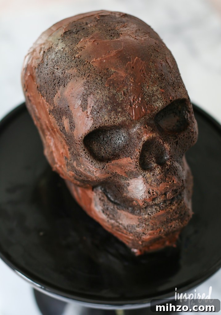 Chocolate Skull Cake Recipe: Decadent Layered Halloween Dessert 9 Chocolate Skull Cake with chocolate frosting.