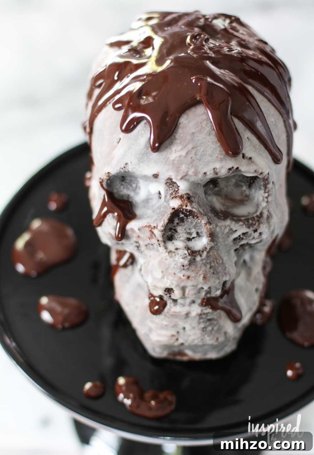 Chocolate Skull Cake Recipe: Decadent Layered Halloween Dessert 11 chocolate skull cake with chocolate frosting.