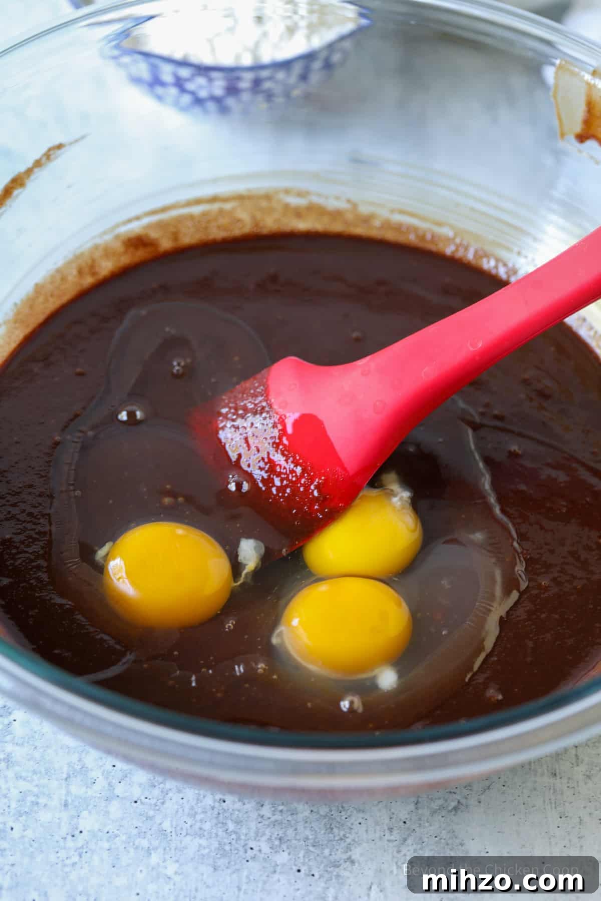 Eggs added to melted chocolate.