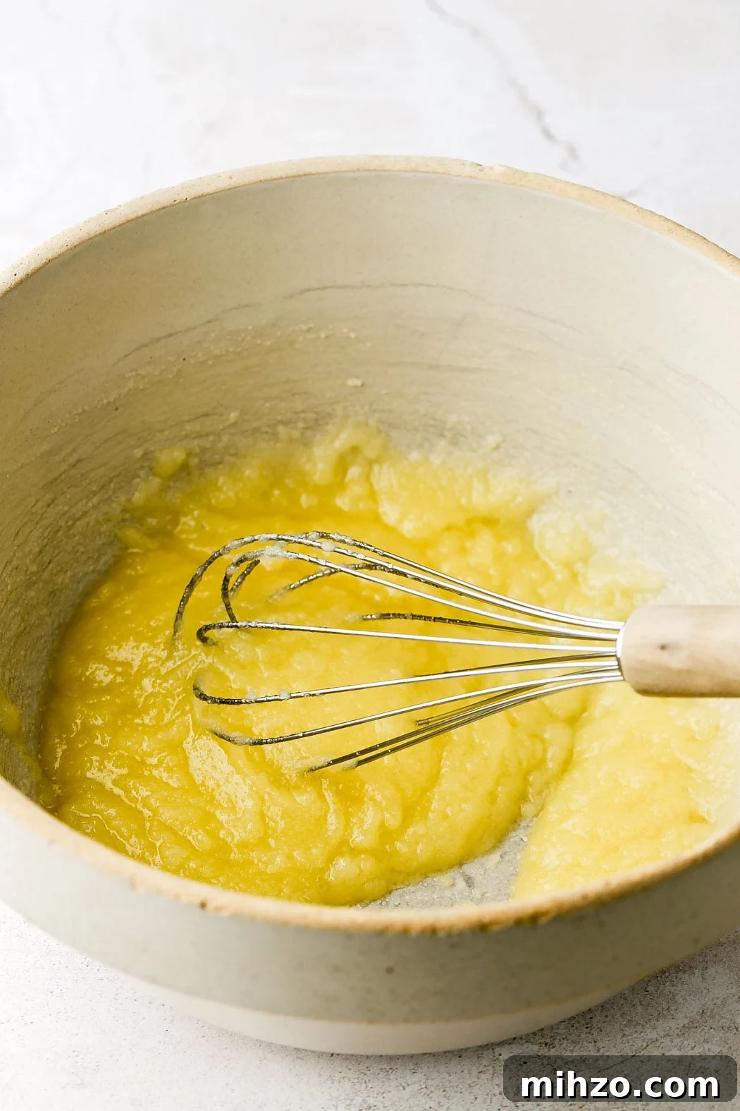 Ultimate Homemade Vanilla Muffins Recipe 3 melted butter mixed with sugar