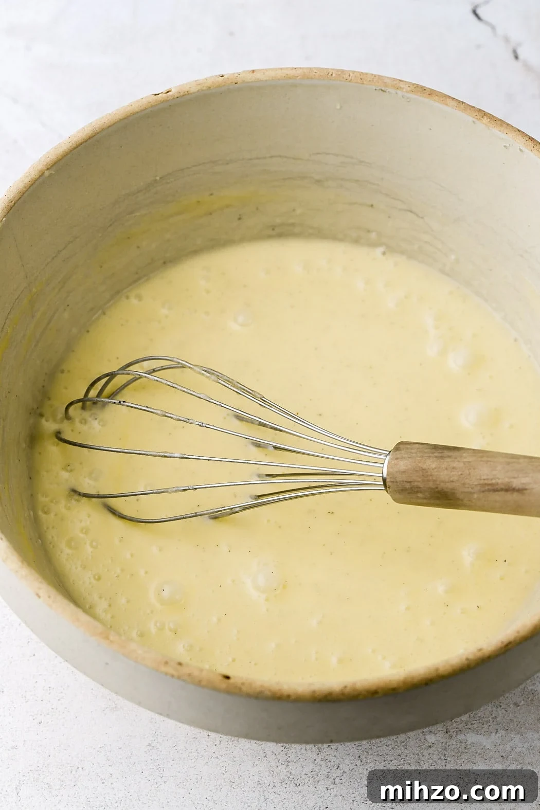 Ultimate Homemade Vanilla Muffins Recipe 5 whisk in greek yogurt and cream
