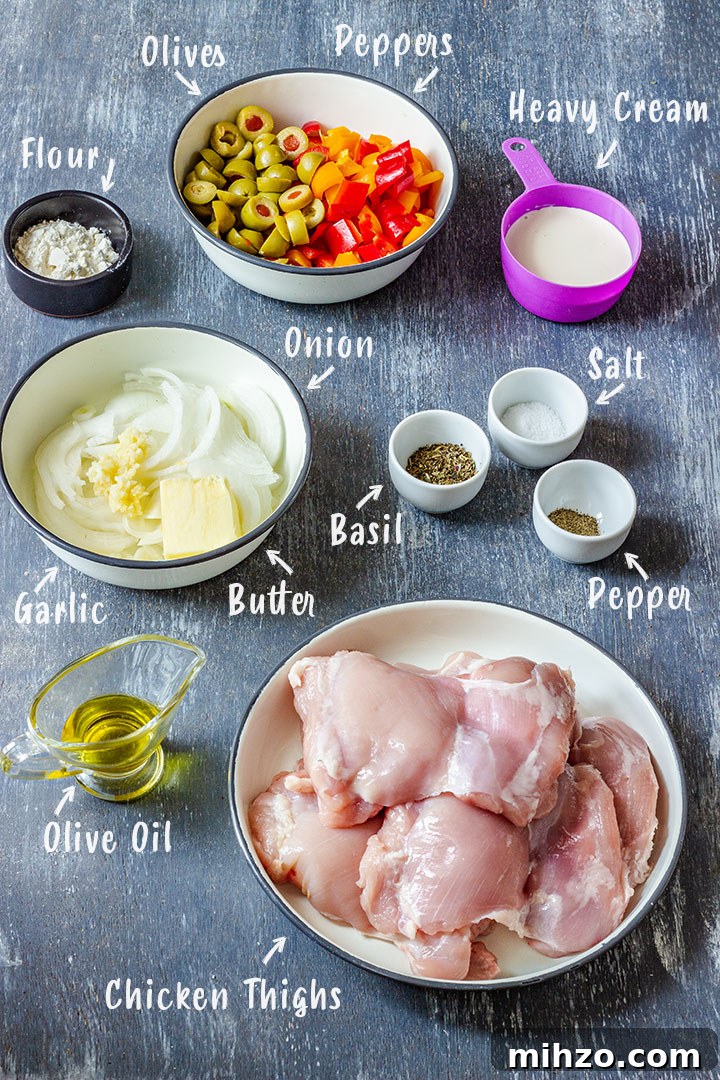 Creamy Garlic Boneless Skinless Chicken Thighs Recipe 3 Ingredients for creamy chicken thighs, including olives, peppers, onion, garlic, flour, cream, oil and seasonings.