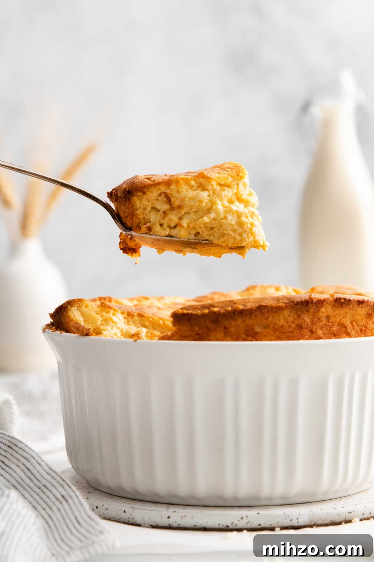 Egg souffle on a spoon.
