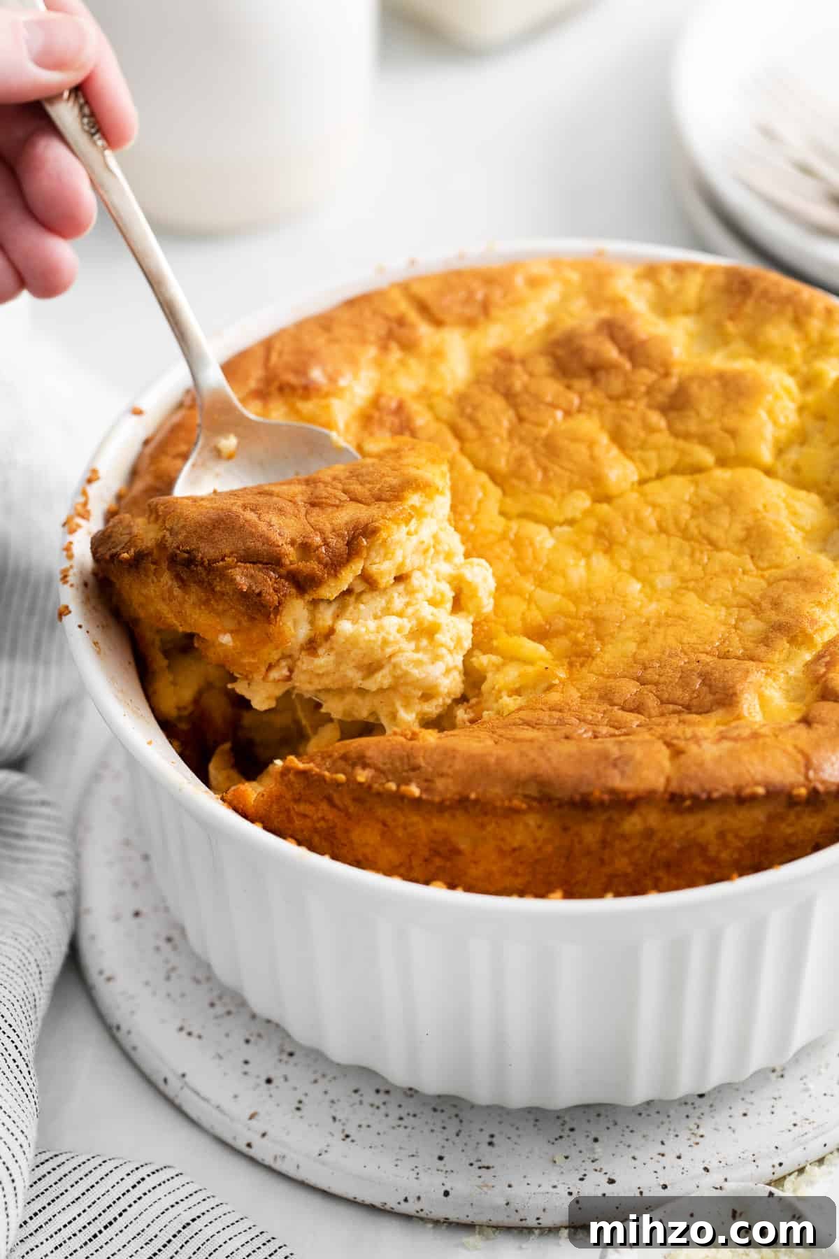 Egg souffle on a spoon.