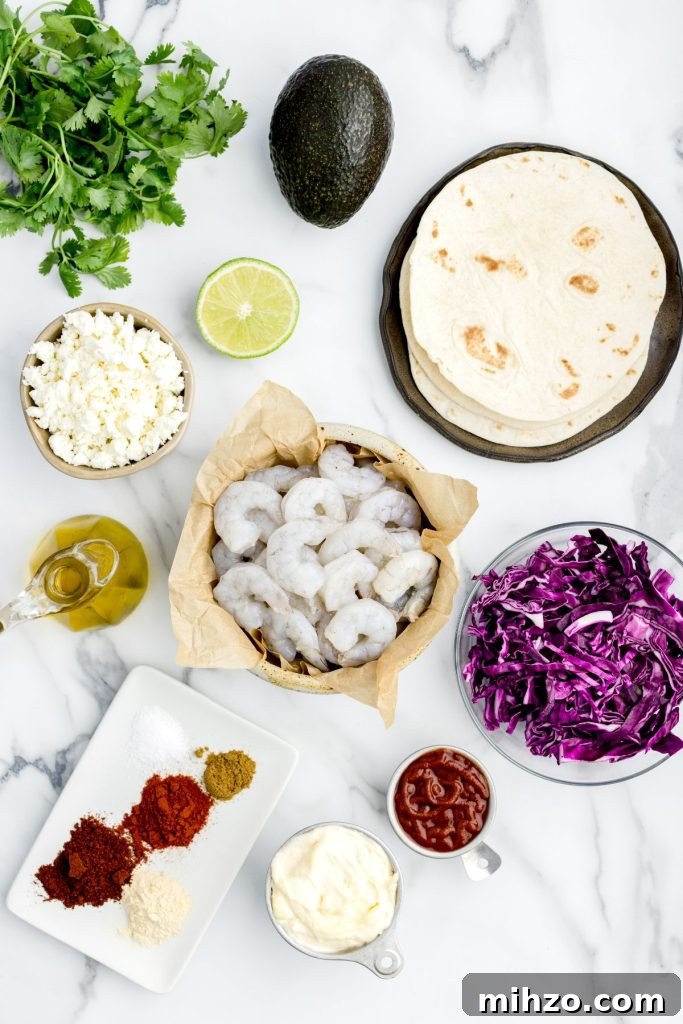 Crispy Air Fryer Shrimp Tacos with Lime Slaw and Spicy Mayo 3 Ingredients around uncooked shrimp