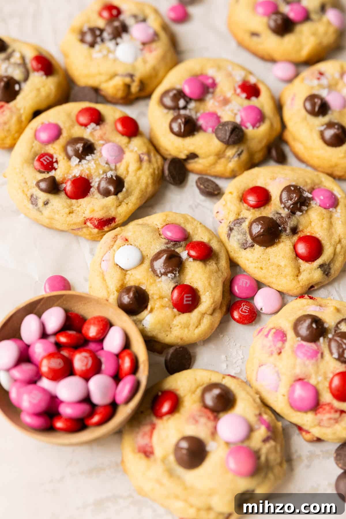 Valentine’s Day M&M Cookie Recipe: Festive Chocolate Cookies 3 cookies made with valentines m&ms.