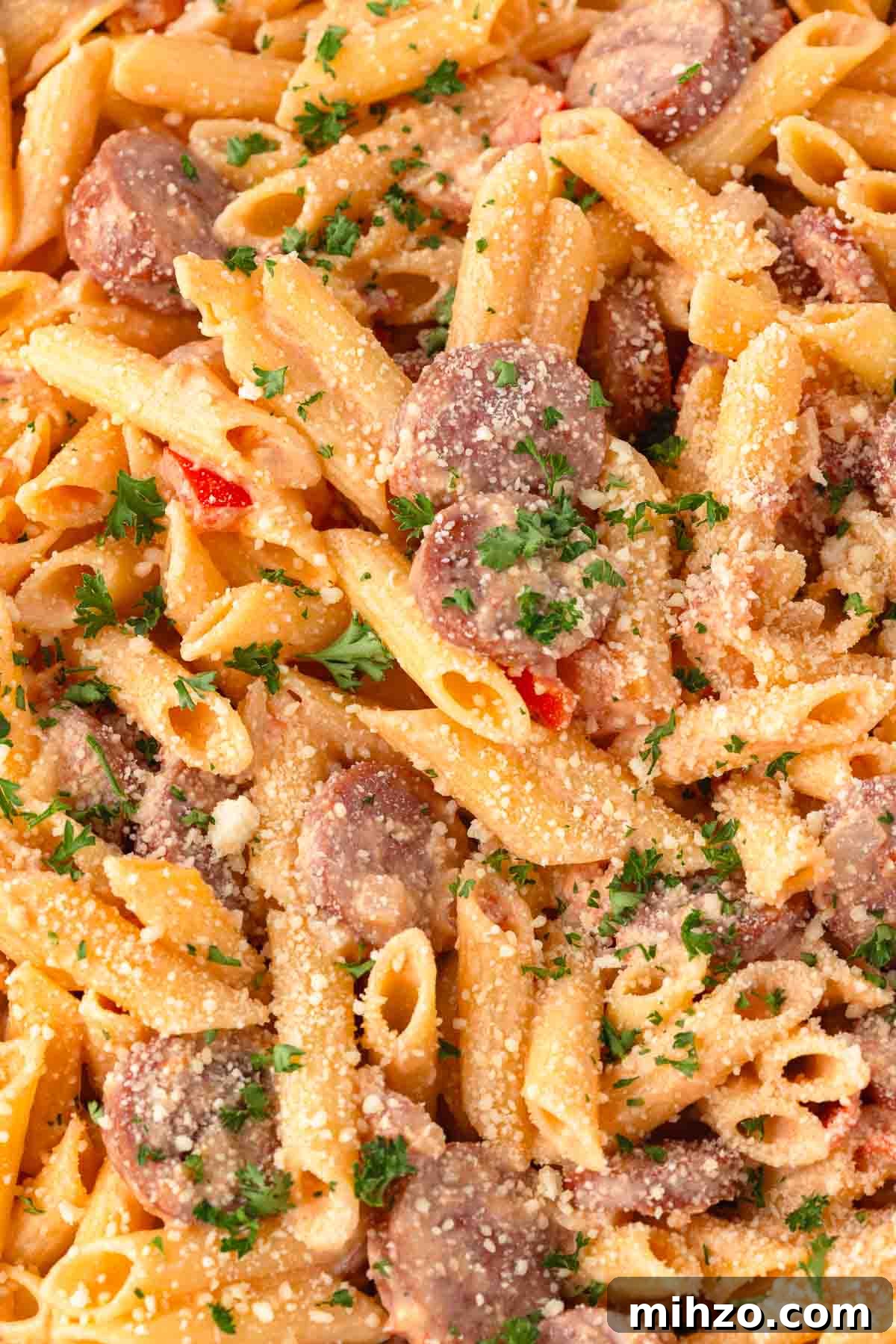 Creamy Kielbasa and Smoked Sausage Pasta Skillet Recipe 12 Kielbasa pasta garnished with fresh chopped parsley.