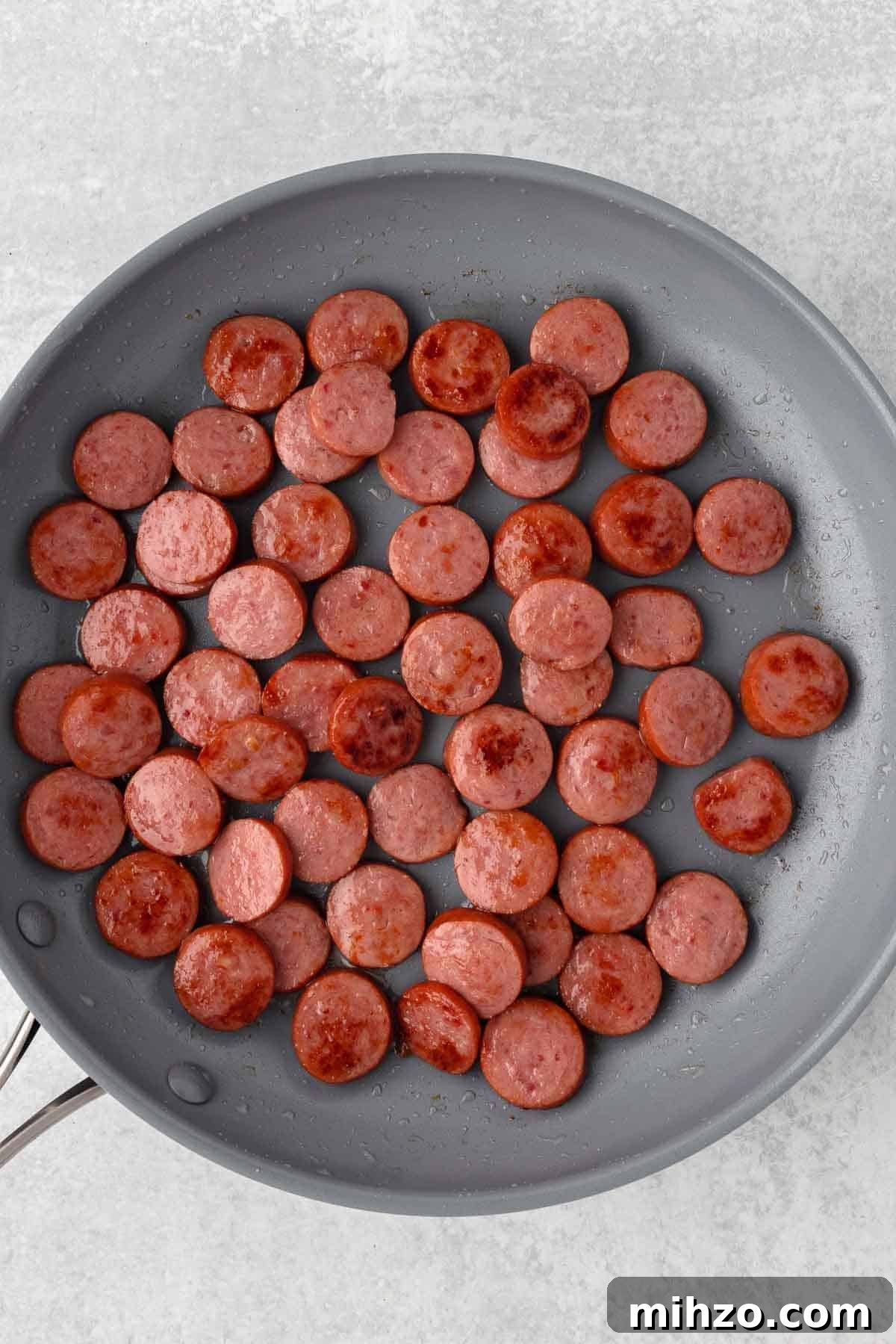 Creamy Kielbasa and Smoked Sausage Pasta Skillet Recipe 4 Slices of Kielbasa cooked in a large skillet until lightly browned.