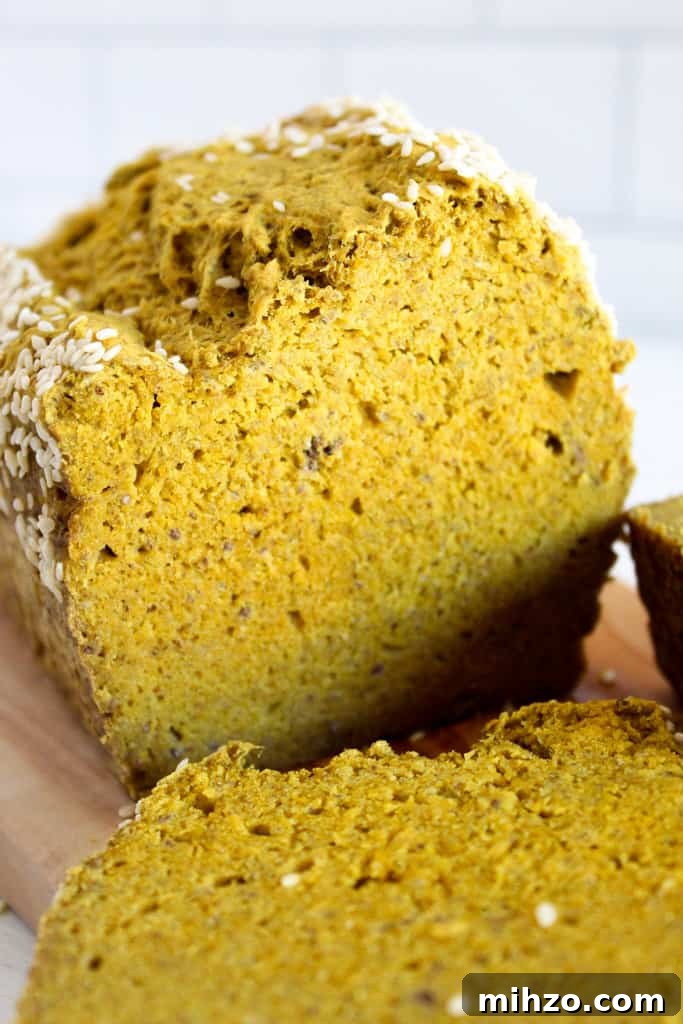 Sliceable Chia Seed Bread for Gluten-Free Toasts & Sandwiches 3 inside of a loaf of chia seed bread.