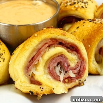 Easy Reuben Rolls Ups (Beef Pinwheel Rolls) with Crescent Dough on White Plate