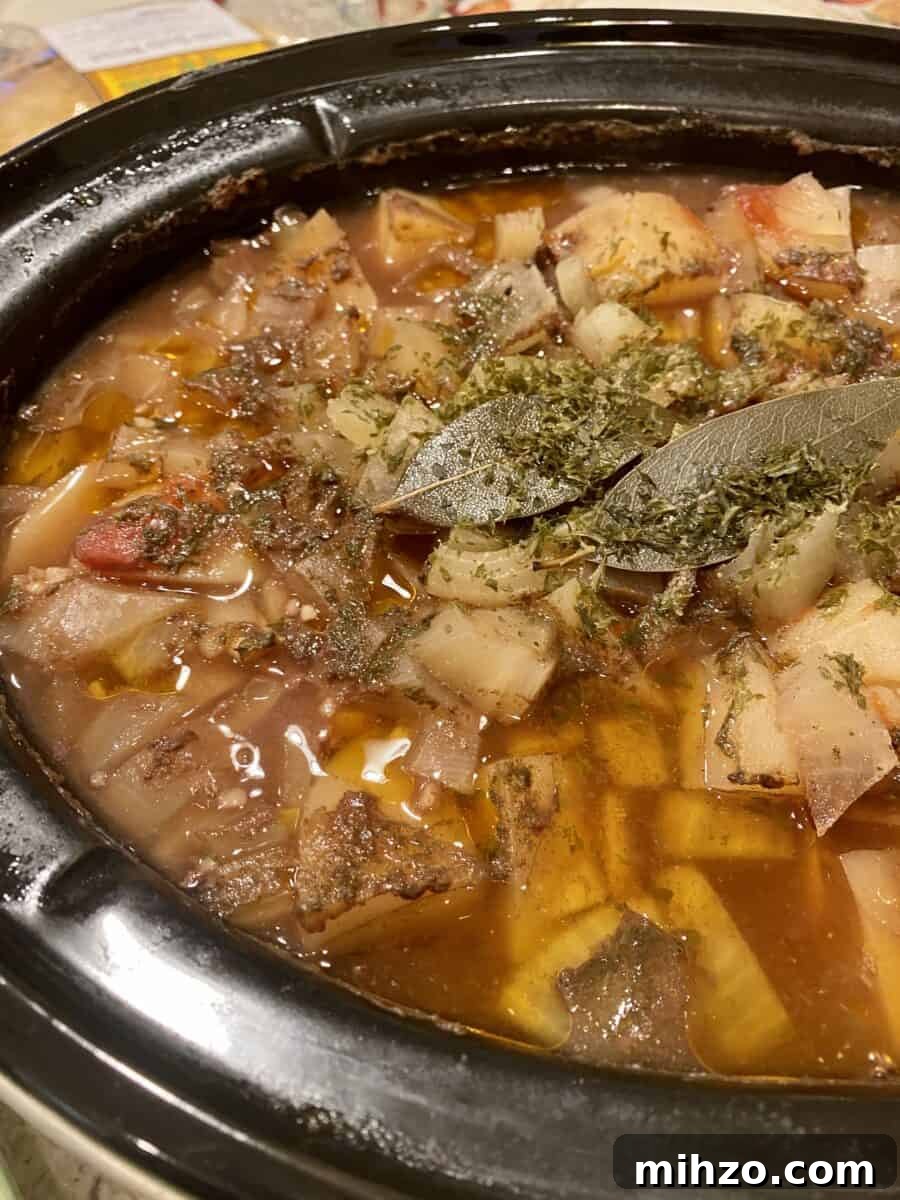 Classic Irish Beef Stew Recipe for Tender, Rich Flavor 16 A crockpot full of cooked St. Patrick's Day stew.