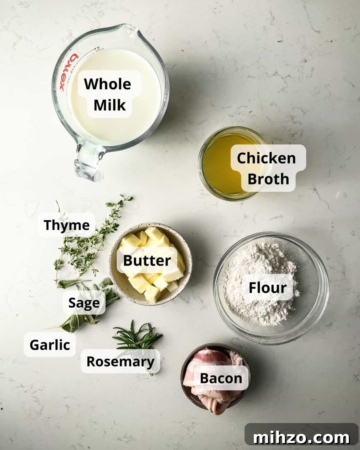 Creamy White Pepper Gravy Recipe for Biscuits and Roast 4 ingredients to make white pepper gravy - bacon, flour, chicken broth, milk, fresh herbs, and butter.