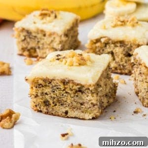 Brown Butter Banana Bread Bars Recipe — Moist Banana Bars 11 Browned butter banana bread cut into squares.