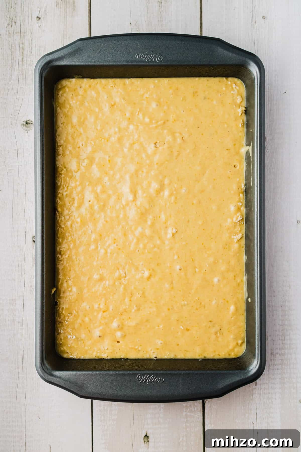 Brown Butter Banana Bread Bars Recipe — Moist Banana Bars 7 The batter in a pan.