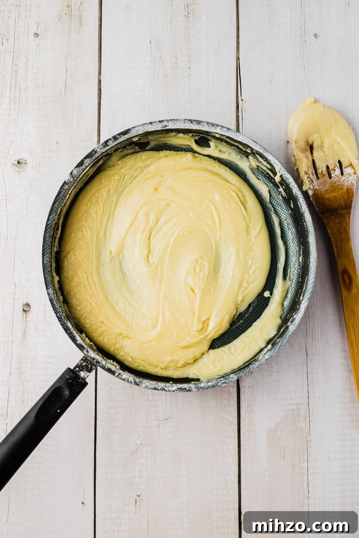 Brown Butter Banana Bread Bars Recipe — Moist Banana Bars 9 Mixing the frosting.
