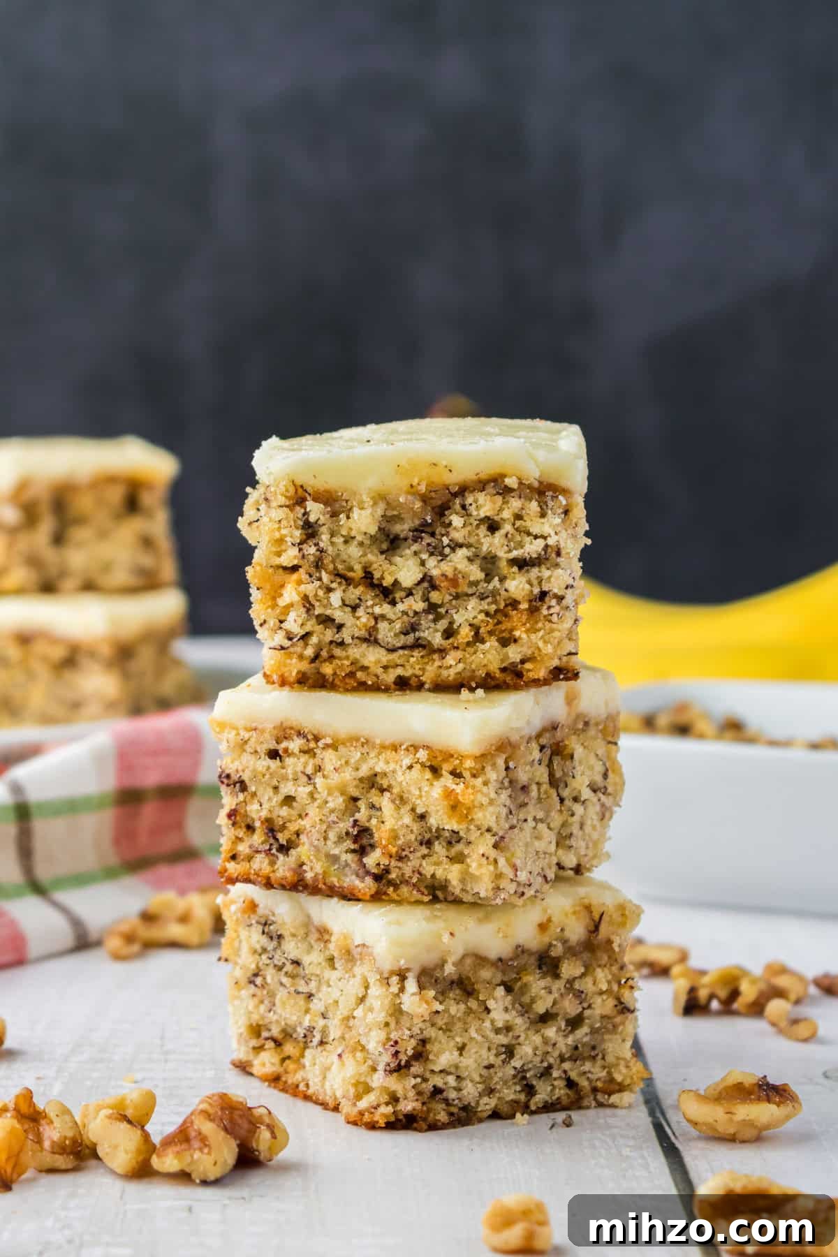 Brown Butter Banana Bread Bars Recipe — Moist Banana Bars 10 Three brown butter banana bread bars stacked up.