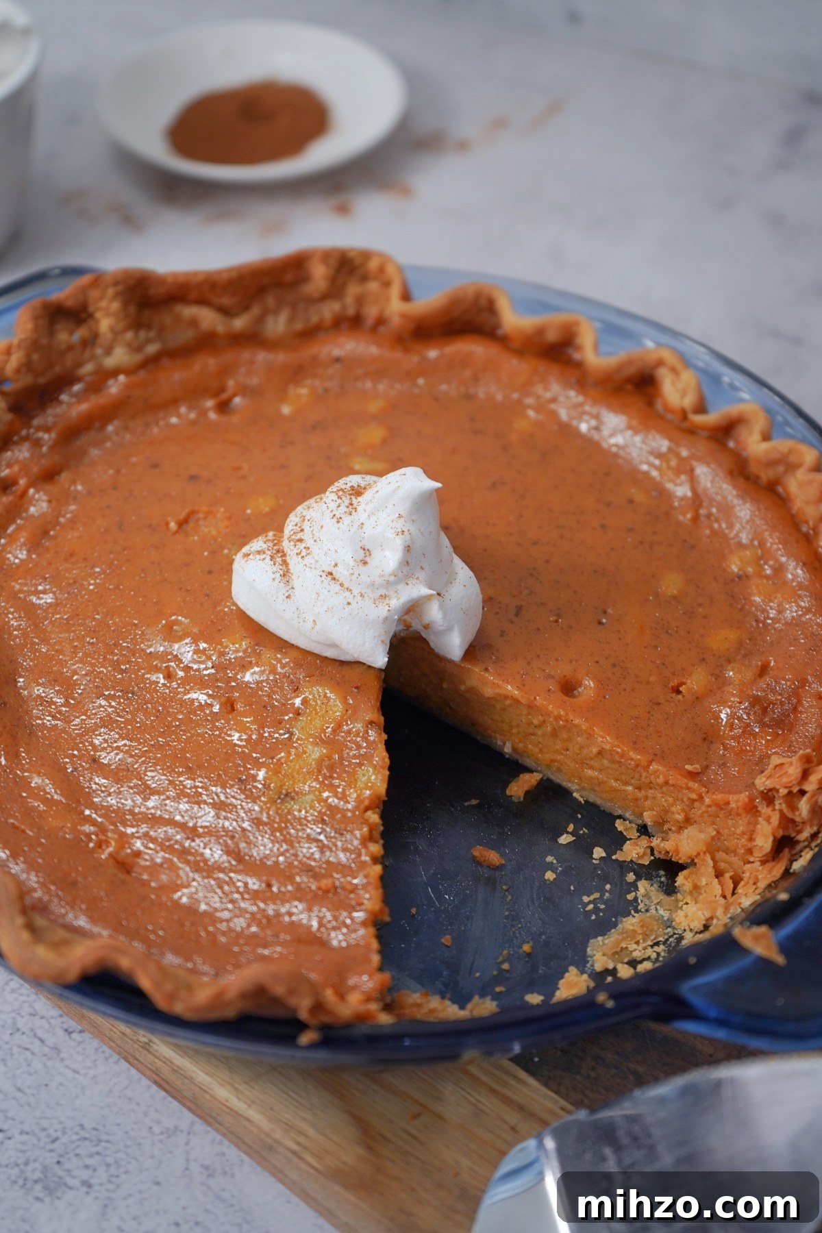 Slice missing from pumpkin pie