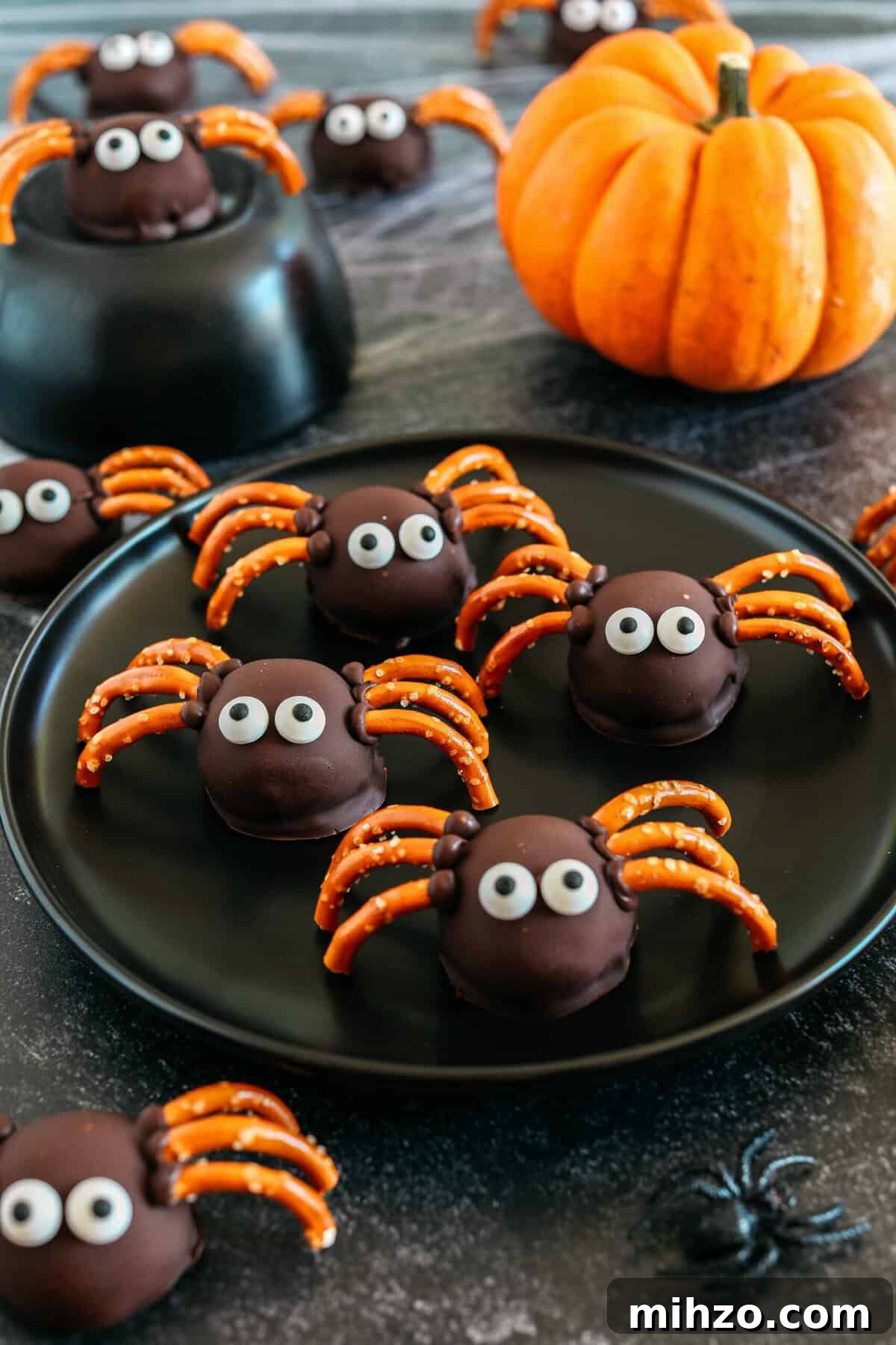Chocolate Peanut Butter Spider Balls Recipe for Halloween Treats 6 Chocolate Peanut Butter Spider Balls in container