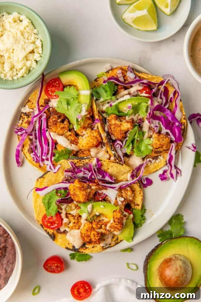 Crispy Cauliflower Tacos with Cilantro Yogurt Crema 4 crispy roasted cauliflower tacos
