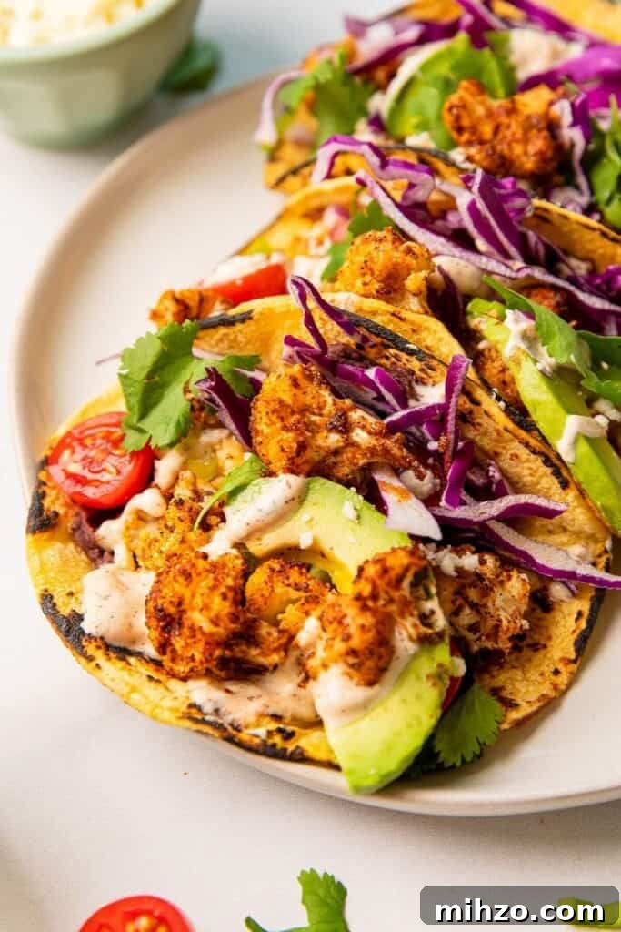 Crispy Cauliflower Tacos with Cilantro Yogurt Crema 5 roasted cauliflower taco with crema, avocado, and black beans
