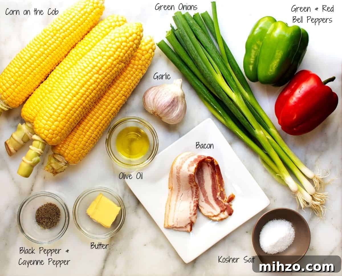 Authentic Cajun Maque Choux Recipe with Sweet Corn and Bacon 3 Corn Maque Choux Ingredients on a white marble board