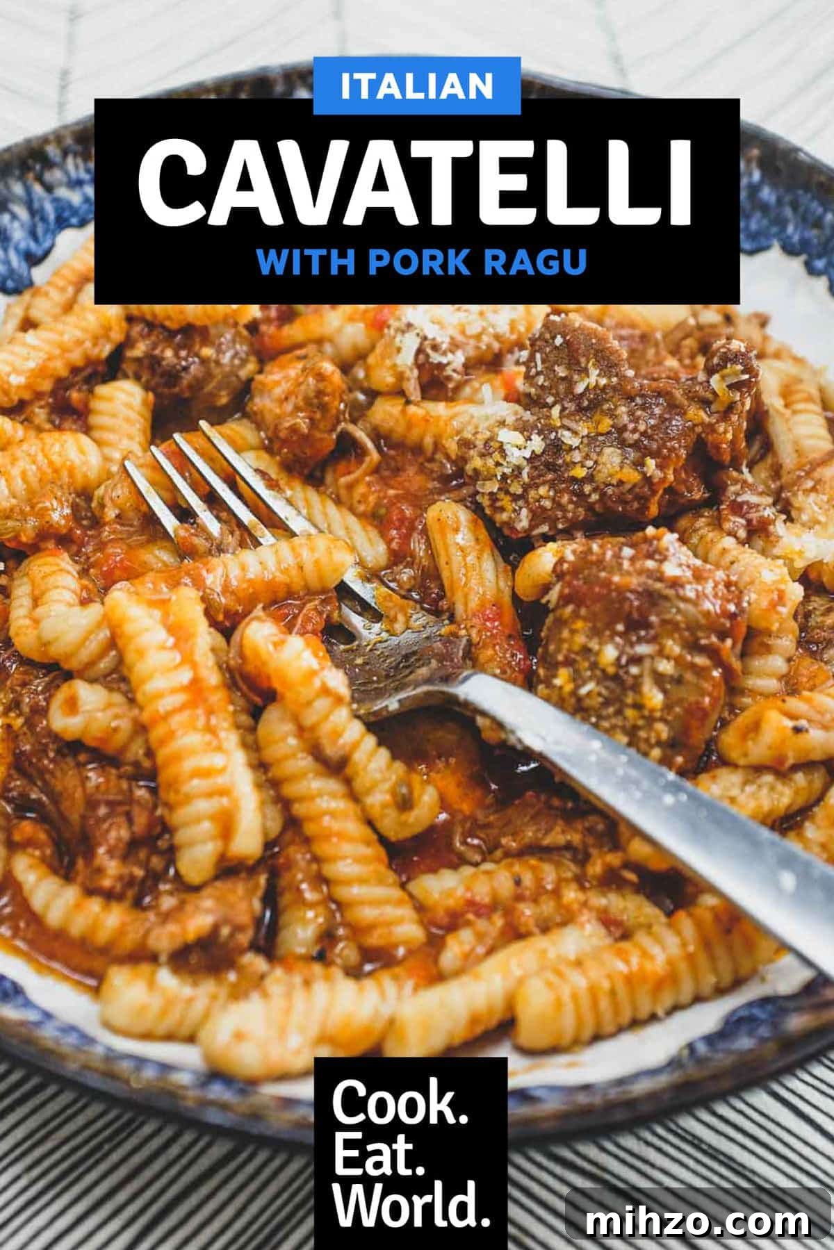 Cavatelli with Pork Ragù | cookeatworld.com A bowl of cavatelli pasta with pork ragù with a fork