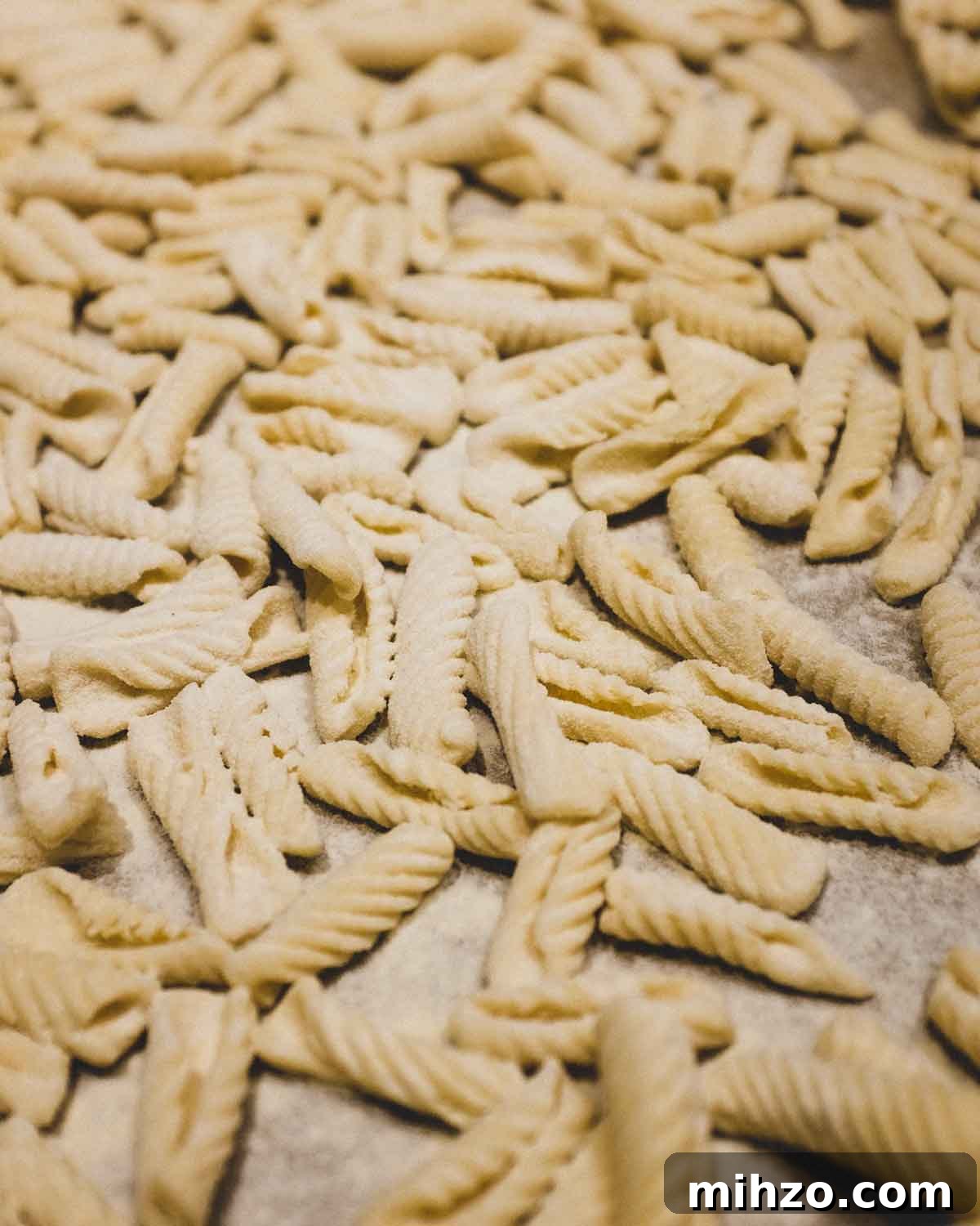 Cavatelli with Pork Ragù | cookeatworld.com Rolled cavatelli on a baking sheet