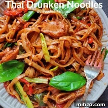 Instant Pot Tom Kha Gai: Creamy Thai Coconut Chicken Soup Recipe 10 instant pot drunken noodles with basil in a beige plate