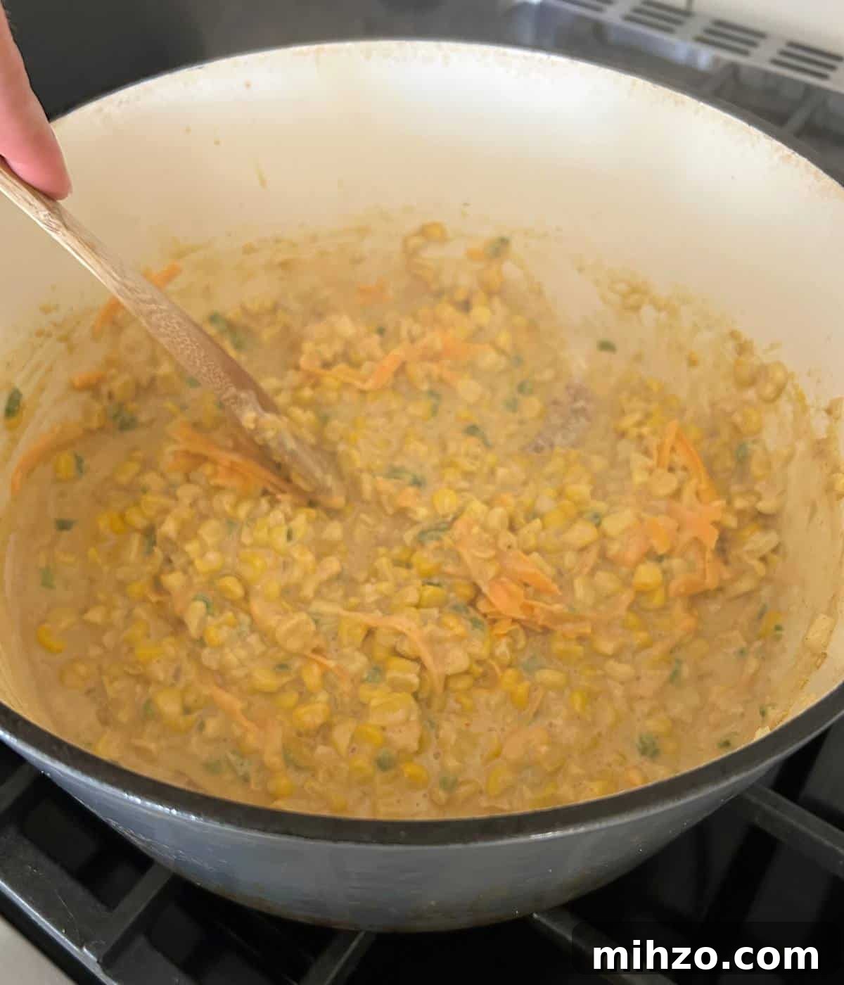 Creamed Corn with Jalapeño: Spicy Southwestern Side Dish 7 Creamed corn in pot.