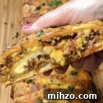 Smoky Sausage & Chorizo Queso Dip Recipe for Game Day 11 Cheesy Taco Stromboli