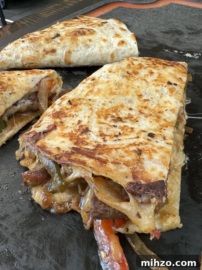 Pepper Steak Quesadillas Recipe: Quick Savory Filled Tortillas 2 cut in half steak quesadillas