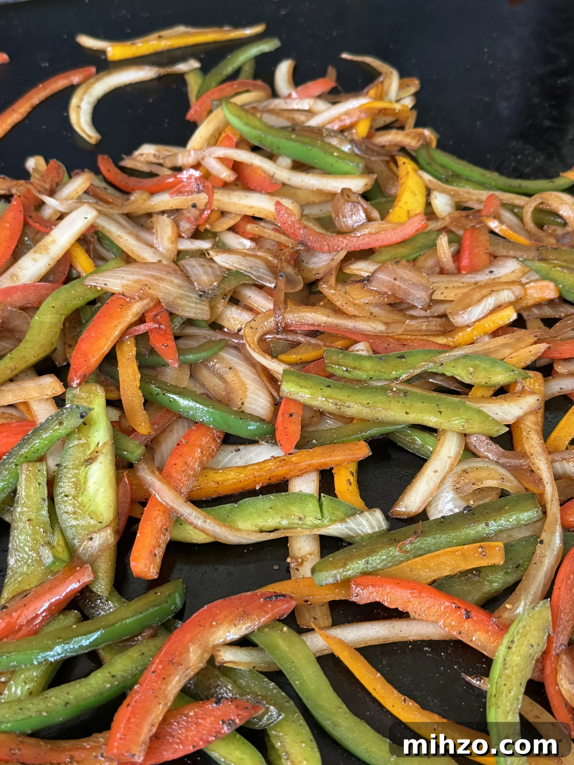 Pepper Steak Quesadillas Recipe: Quick Savory Filled Tortillas 3 cooking vegetables on the flat top